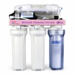 Front view of Aqua Cares RO purifier with two white housings and one clear sediment-filter housing