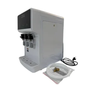 White countertop UF water purifier viewed from the side with water tubing and fittings